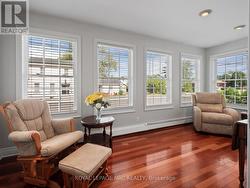 A quiet sunroom is ideal for relaxing and reading. -