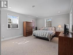 The primary bedroom is very generous in size. -