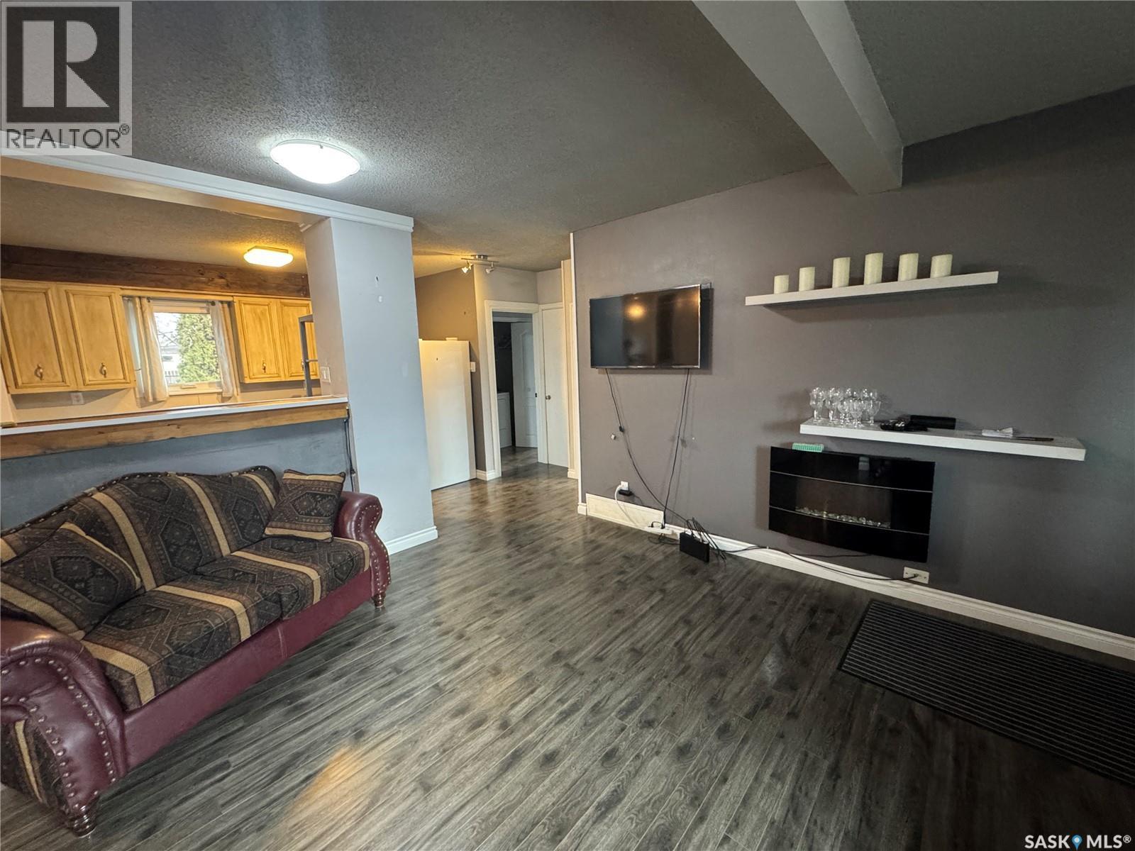 213 3Rd Avenue W, Biggar, SK - Indoor With Fireplace