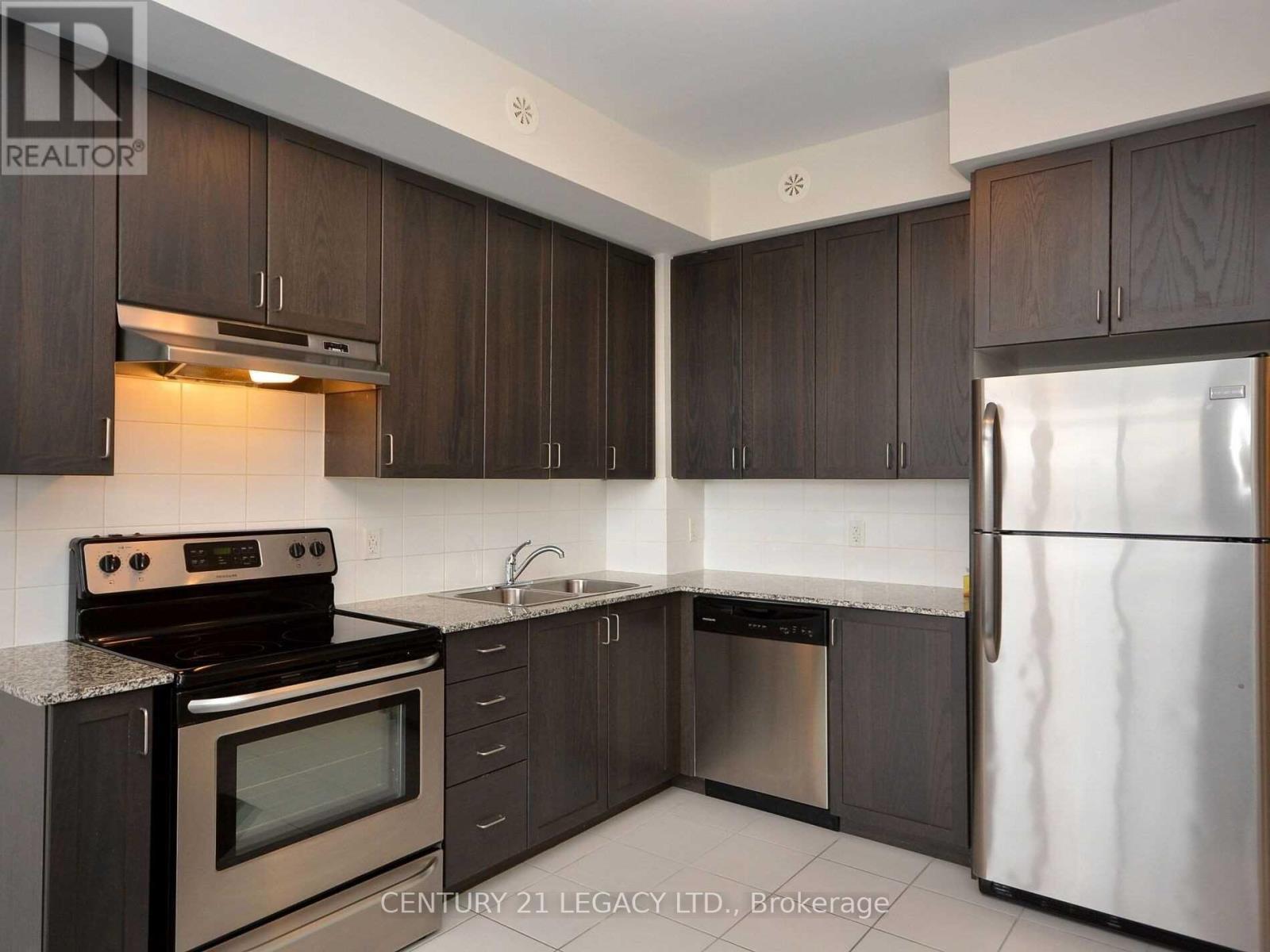 209 - 54 Sky Harbour Drive, Brampton, ON - Indoor Photo Showing Kitchen With Double Sink