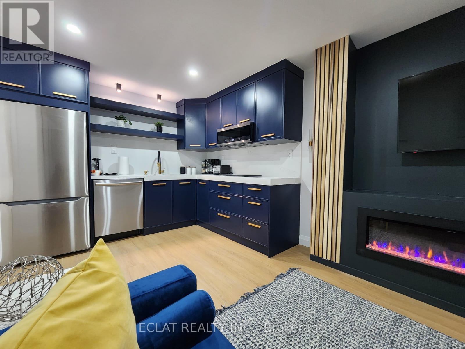 75 Vanilla Trail(Lower), Thorold, ON - Indoor With Fireplace