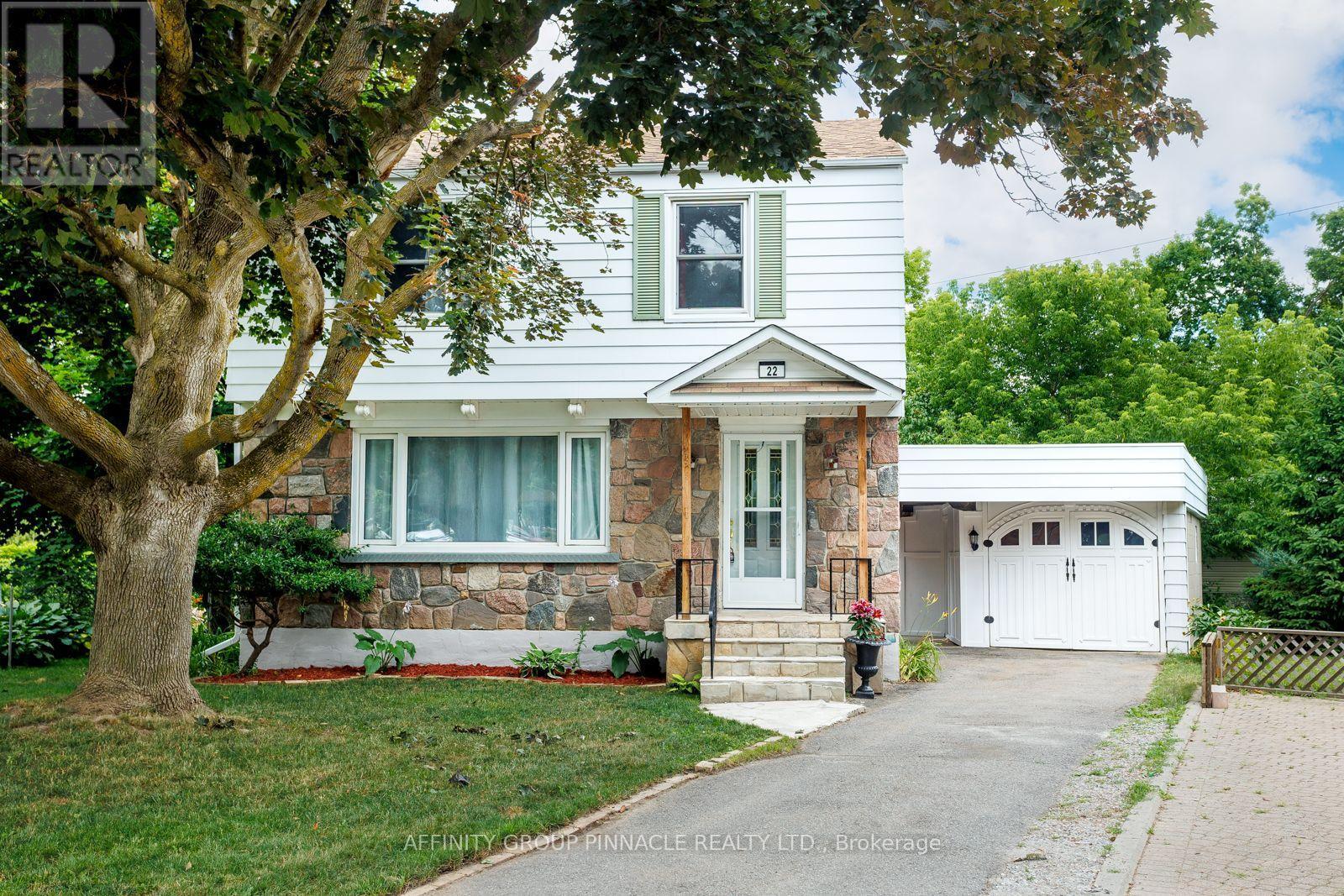 22 Sunset Court, Kawartha Lakes (Lindsay), ON - Outdoor With Facade