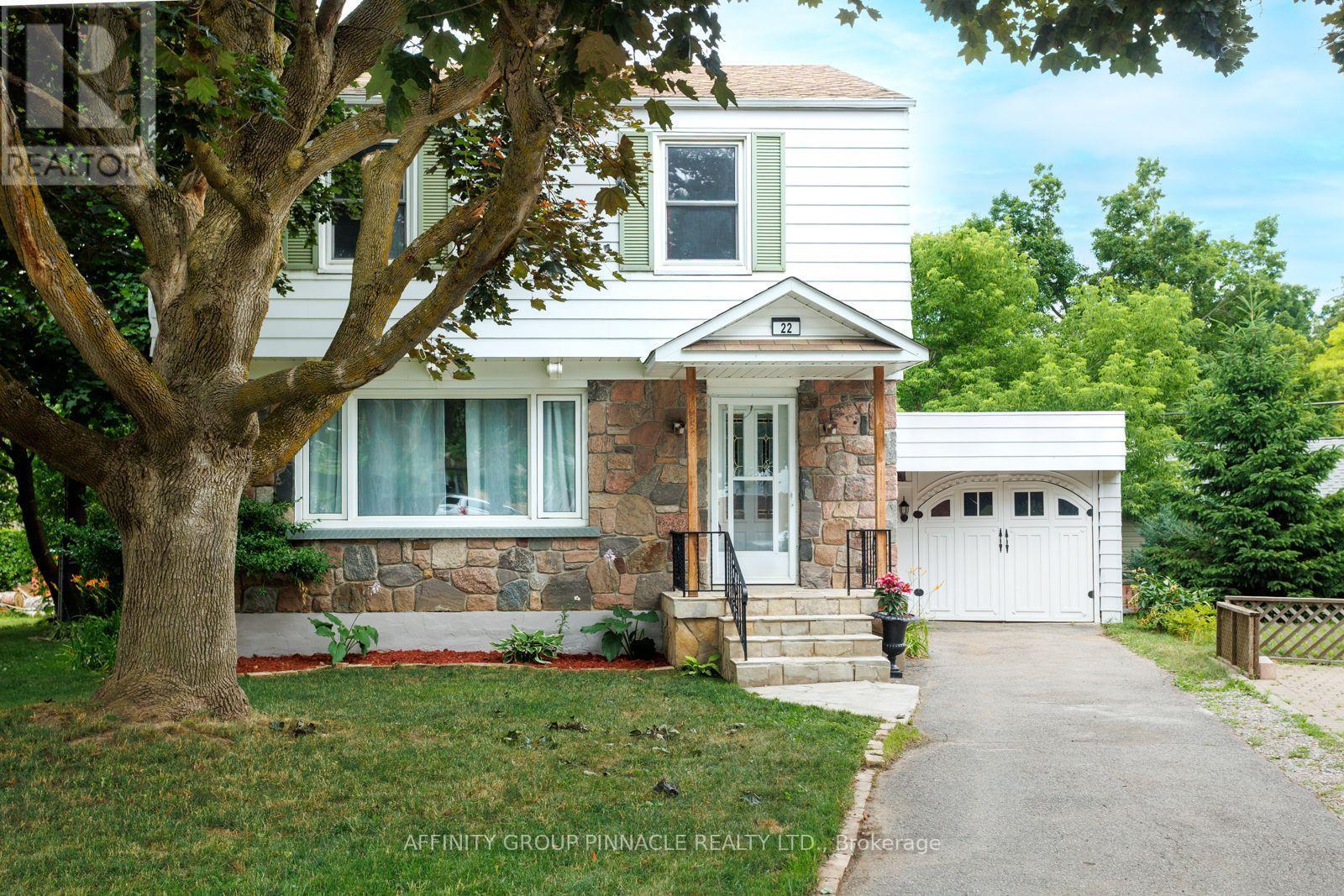 22 Sunset Court, Kawartha Lakes (Lindsay), ON - Outdoor With Facade