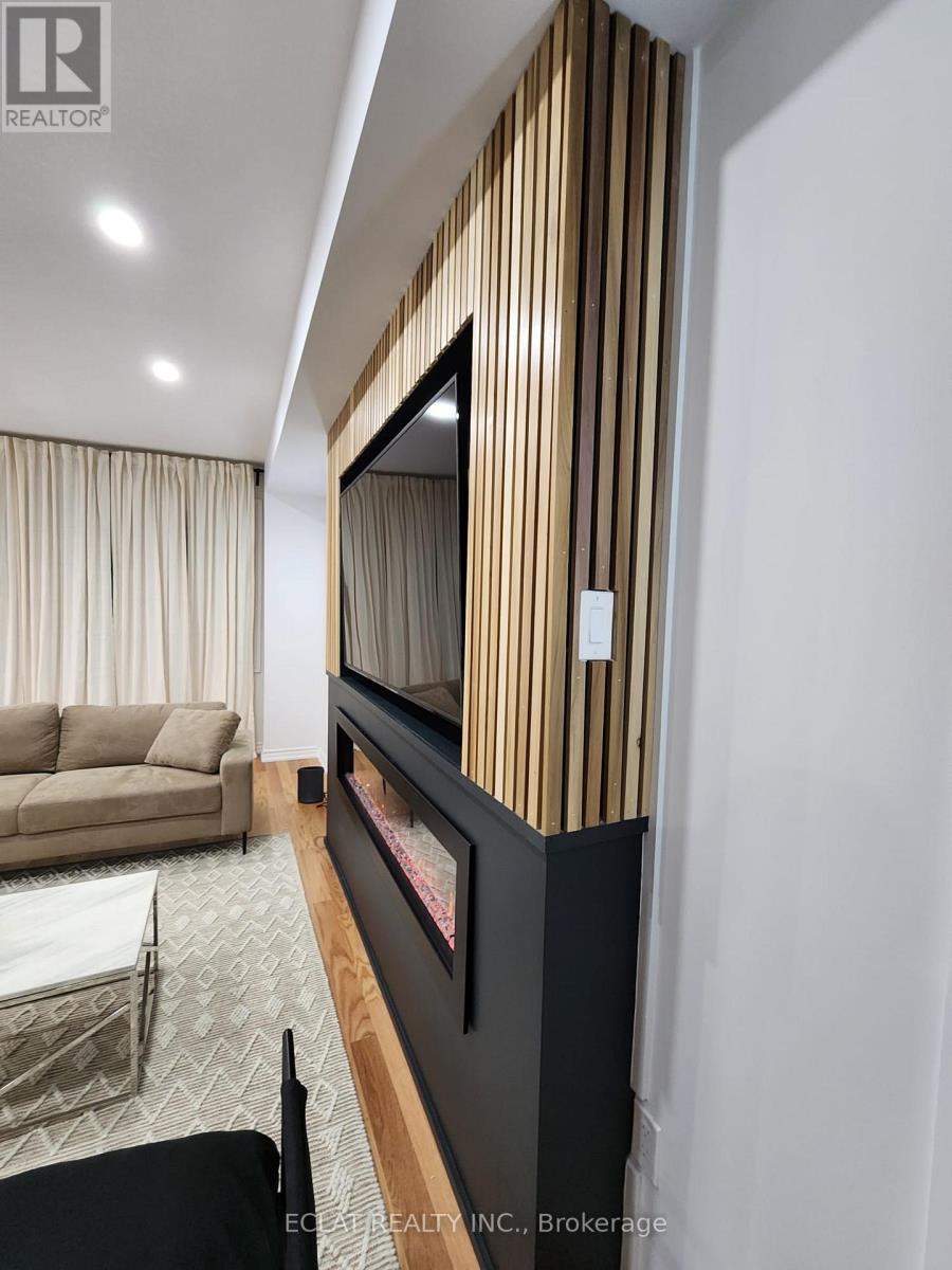 75 Vanilla Trail (Upper), Thorold, ON - Indoor Photo Showing Living Room With Fireplace