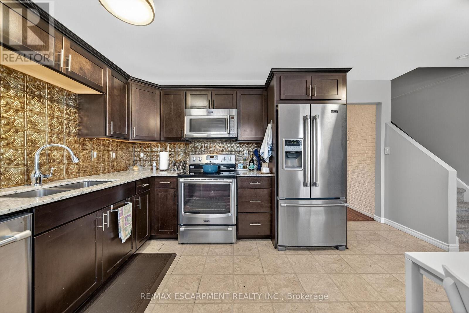 64 - 145 Rice Avenue, Hamilton, ON - Indoor Photo Showing Kitchen With Stainless Steel Kitchen With Double Sink