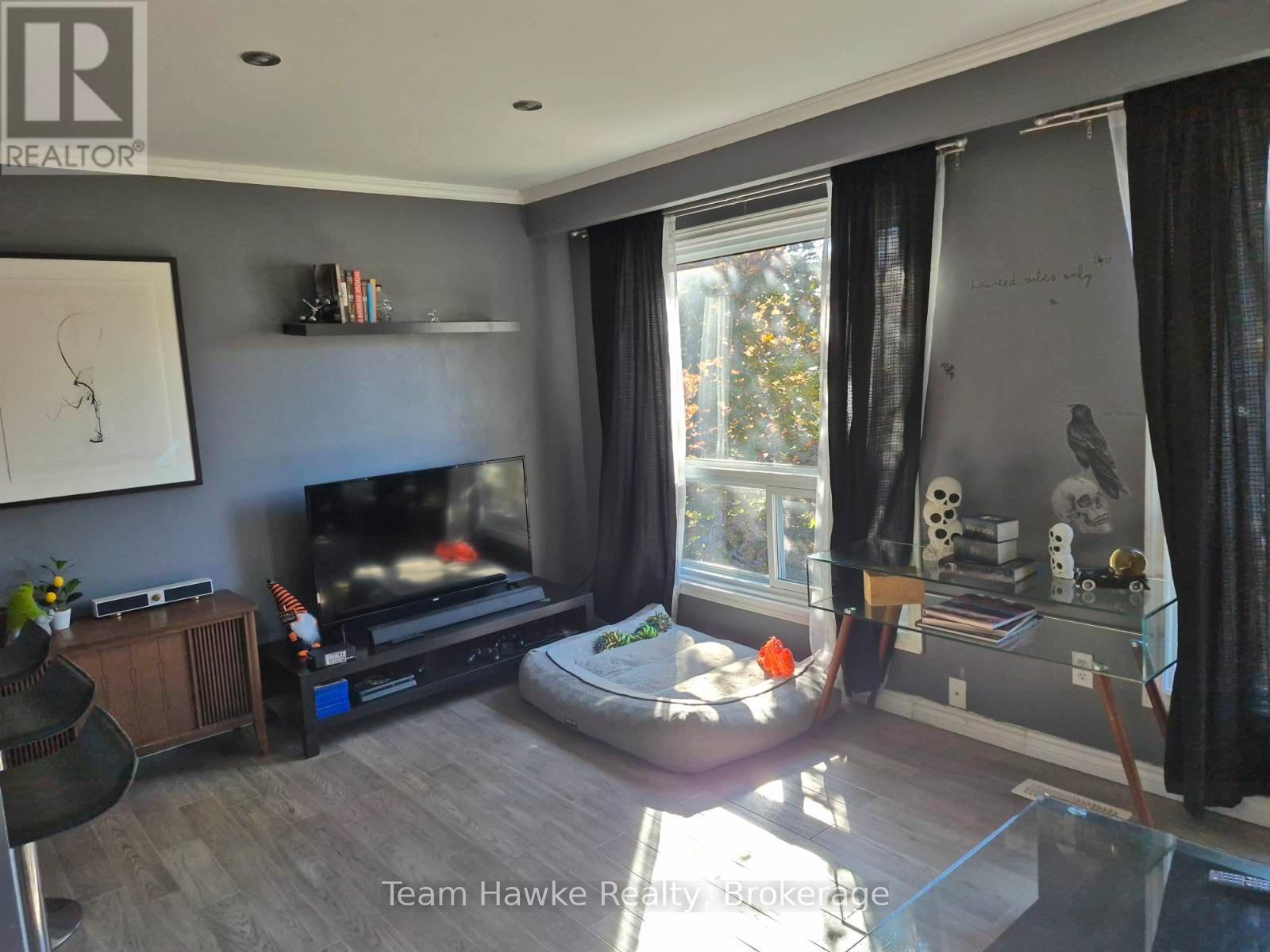 53 - 778 William Street, Midland, ON - Indoor Photo Showing Living Room With Fireplace