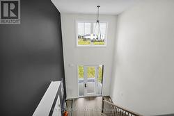 View to front door from upper level -