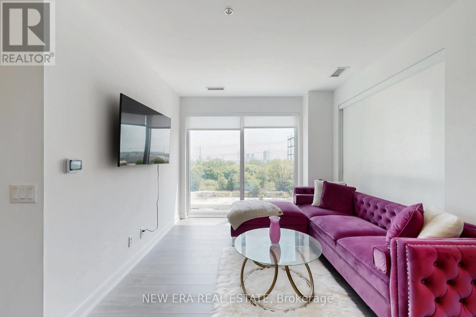 413 - 30 Samuel Wood Way, Toronto, ON - Indoor Photo Showing Living Room