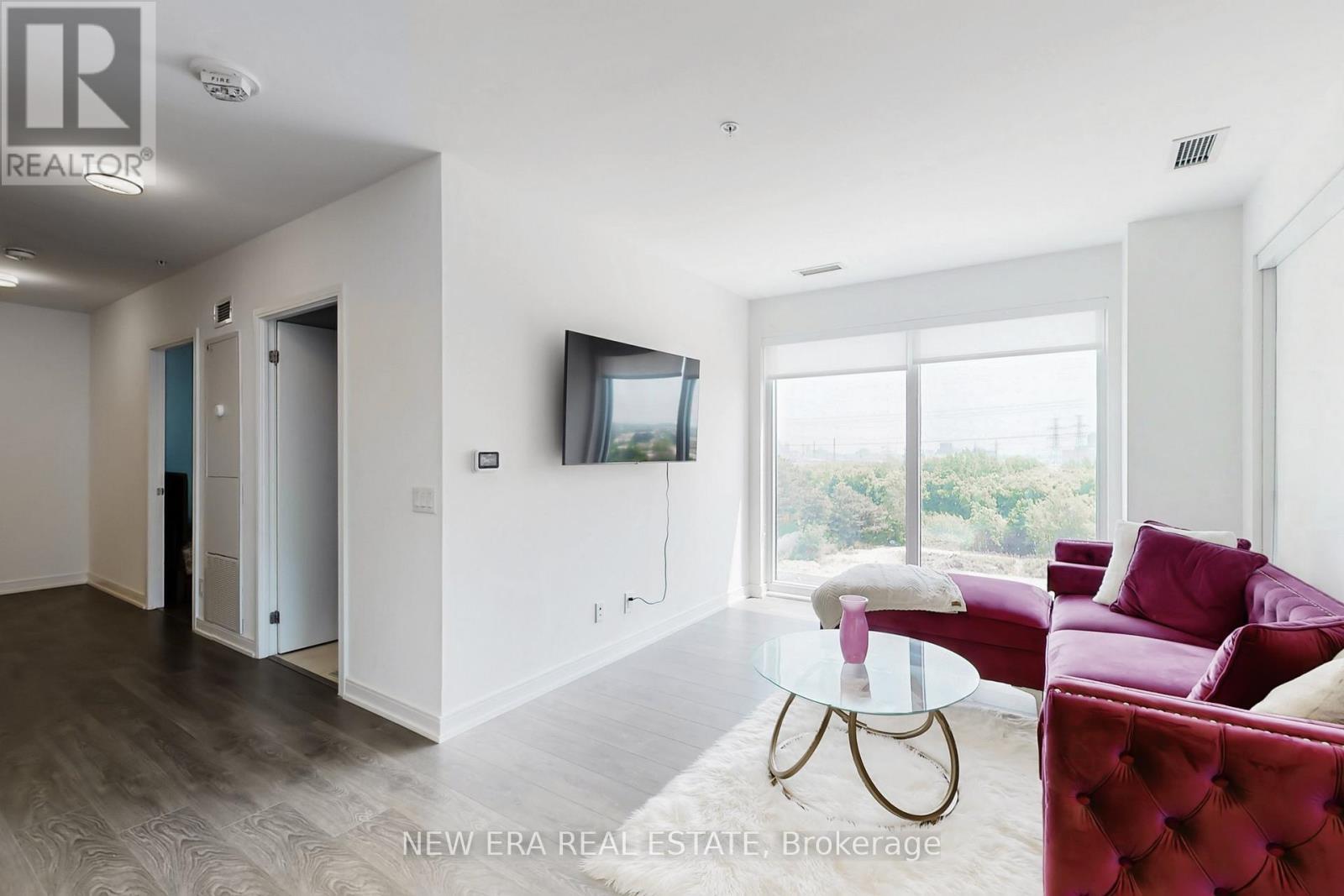 413 - 30 Samuel Wood Way, Toronto, ON - Indoor Photo Showing Living Room