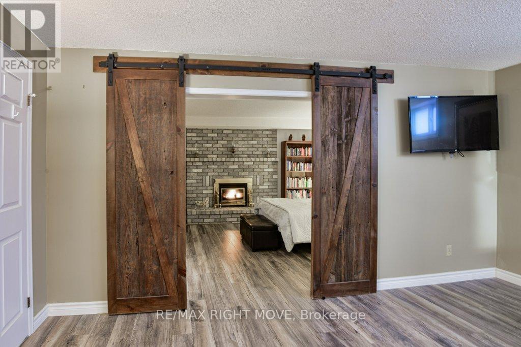 6 Lindsay Crescent, Orillia, ON - Indoor Photo Showing Other Room With Fireplace