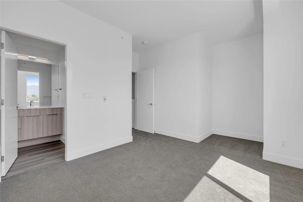 103C-3642 Mission Springs Drive, Kelowna, BC - Indoor Photo Showing Other Room