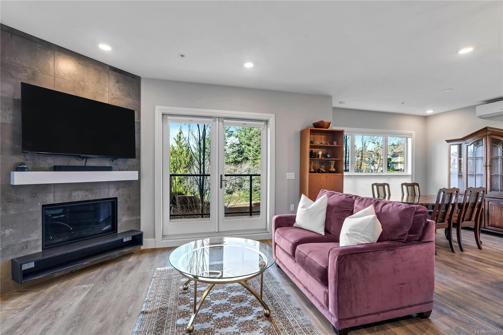 204-741 Travino Lane, Saanich, BC - Indoor Photo Showing Living Room With Fireplace