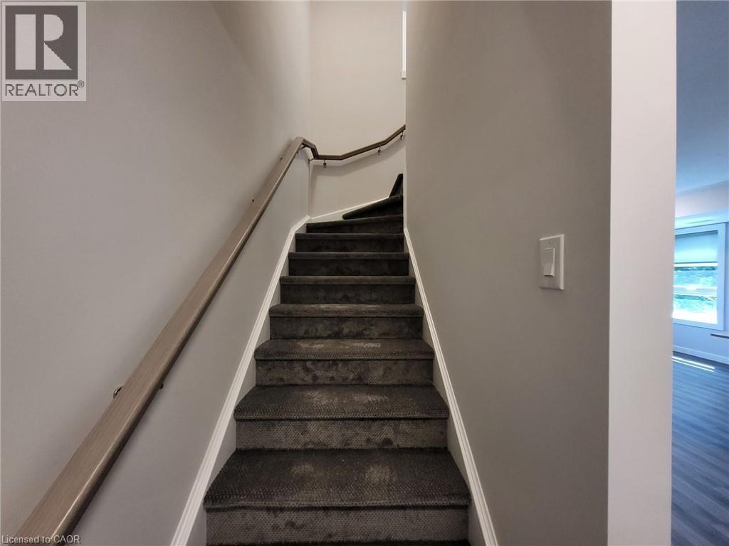 View of stairs - 118 Gravel Ridge Trail Unit# D16, Kitchener, ON - Indoor Photo Showing Other Room
