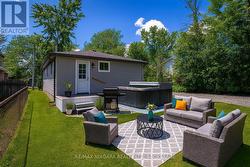 Hot tub area in back yard - Digitally enhanced - -