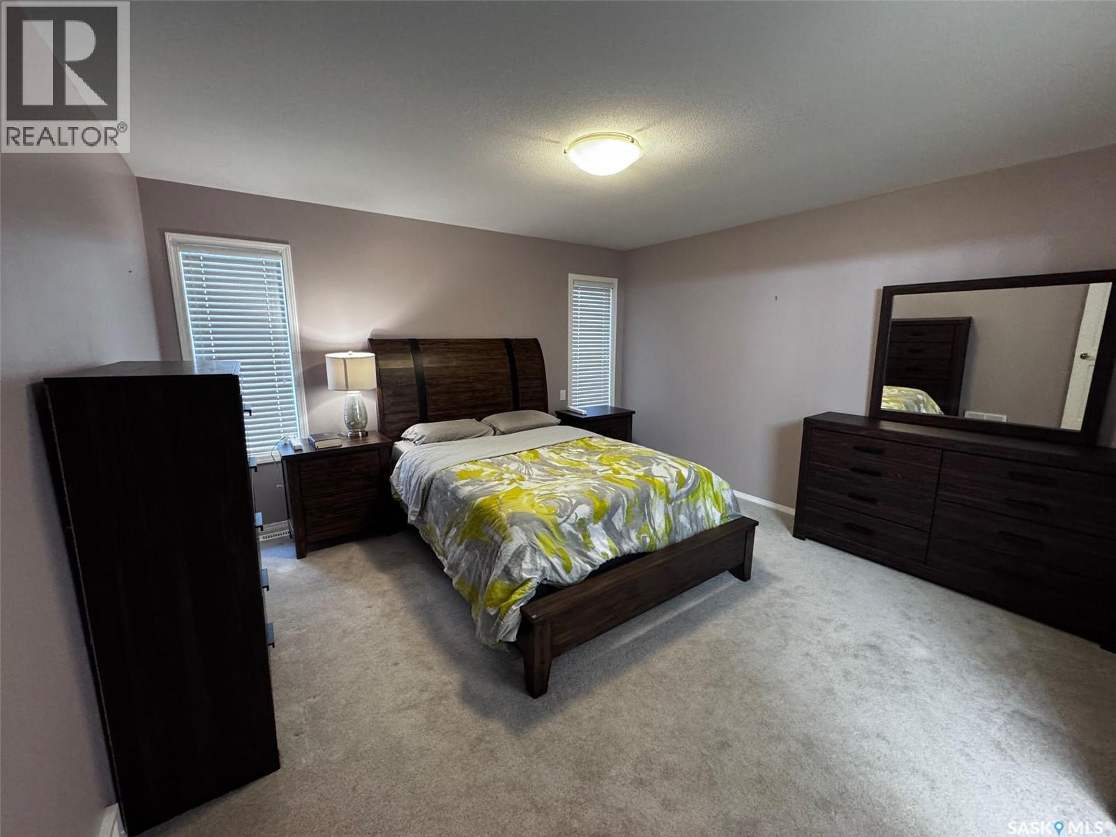 611 Le May Court, Saskatoon, SK - Indoor Photo Showing Bedroom