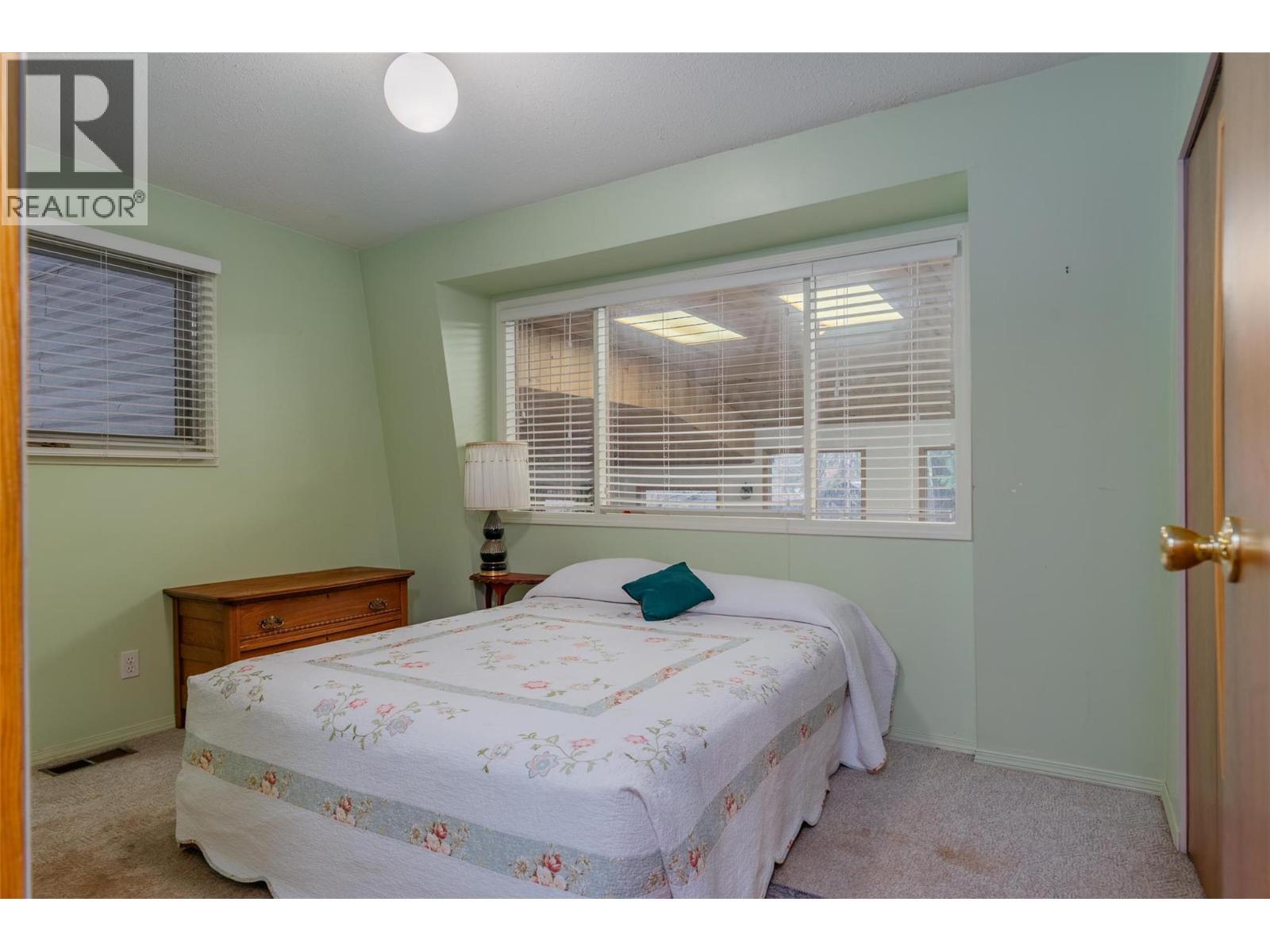 2071 Massie Road, Christina Lake, BC - Indoor Photo Showing Bedroom