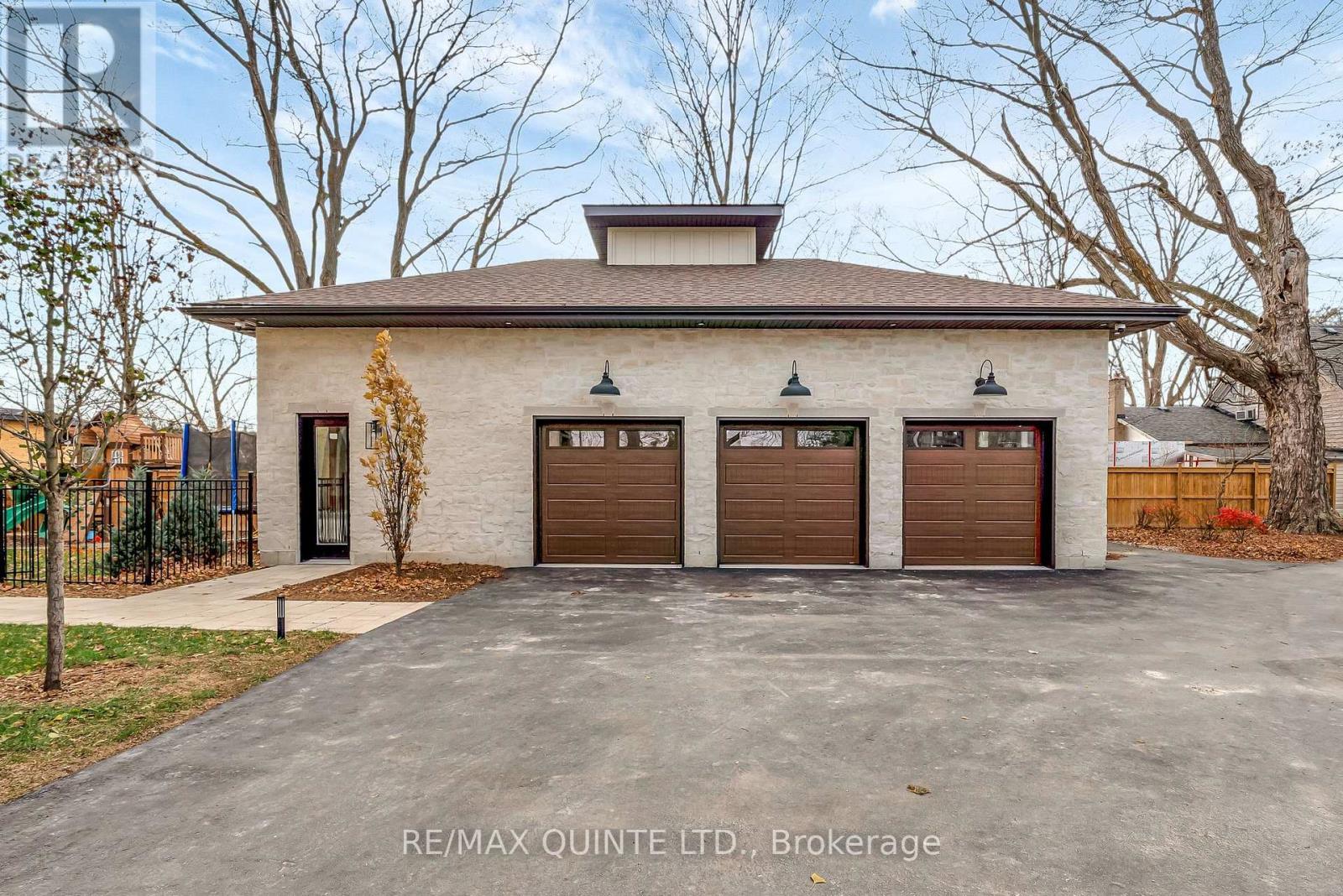3 car garage with 12' ceilings - 88 Bridge Street, Prince Edward County (Picton Ward), ON - Outdoor