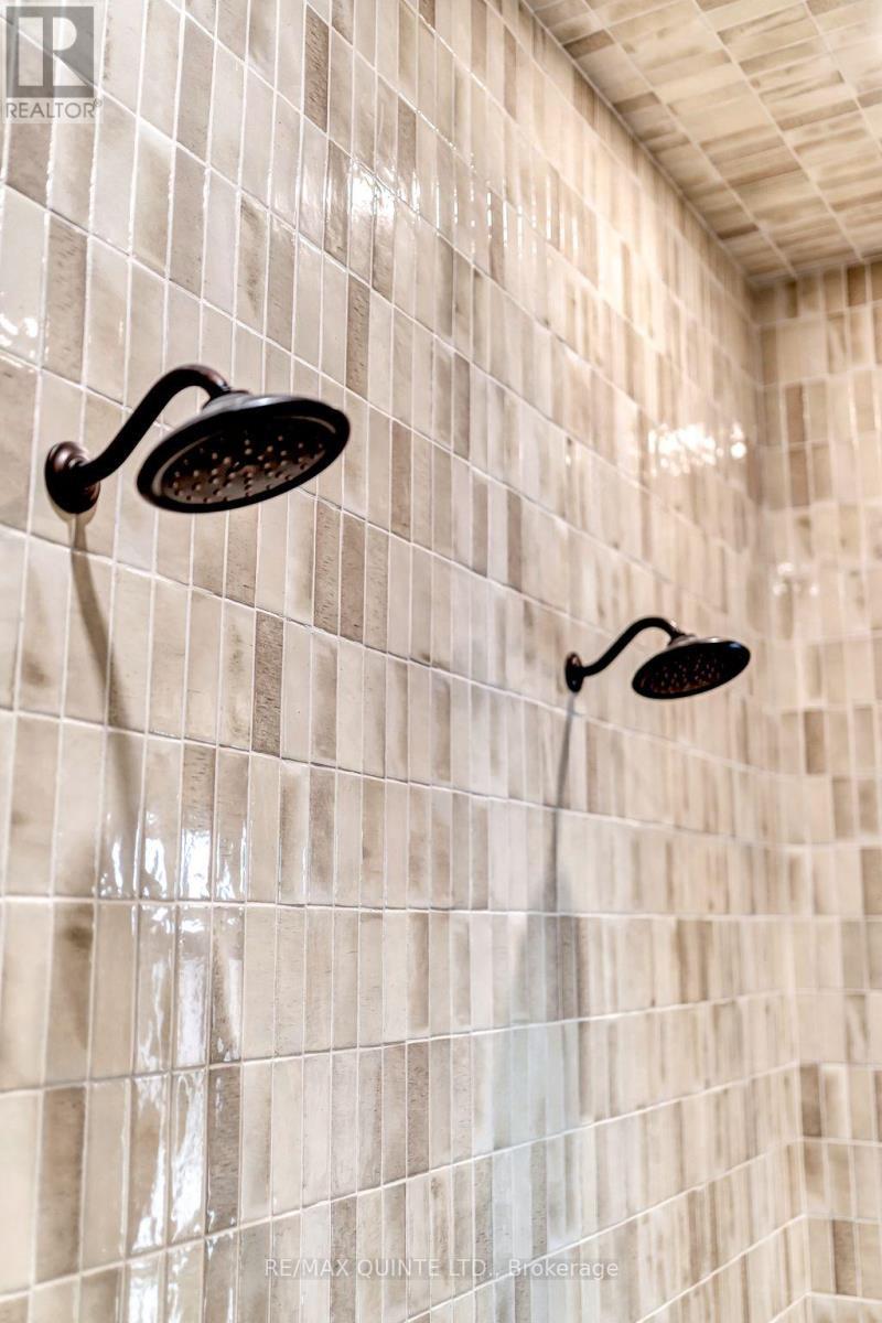 Double shower heads in ensuite - 88 Bridge Street, Prince Edward County (Picton Ward), ON - Indoor Photo Showing Bathroom