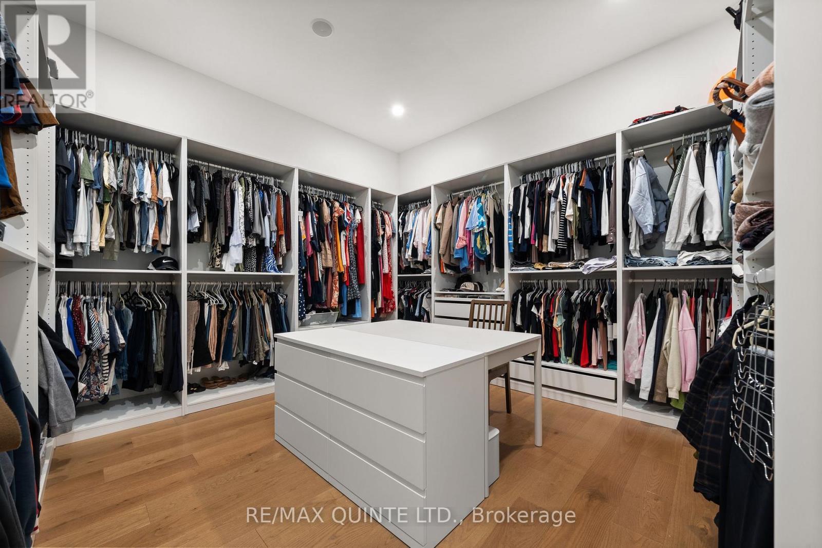 Primary bedroom custom walk in closet - 88 Bridge Street, Prince Edward County (Picton Ward), ON - Indoor With Storage