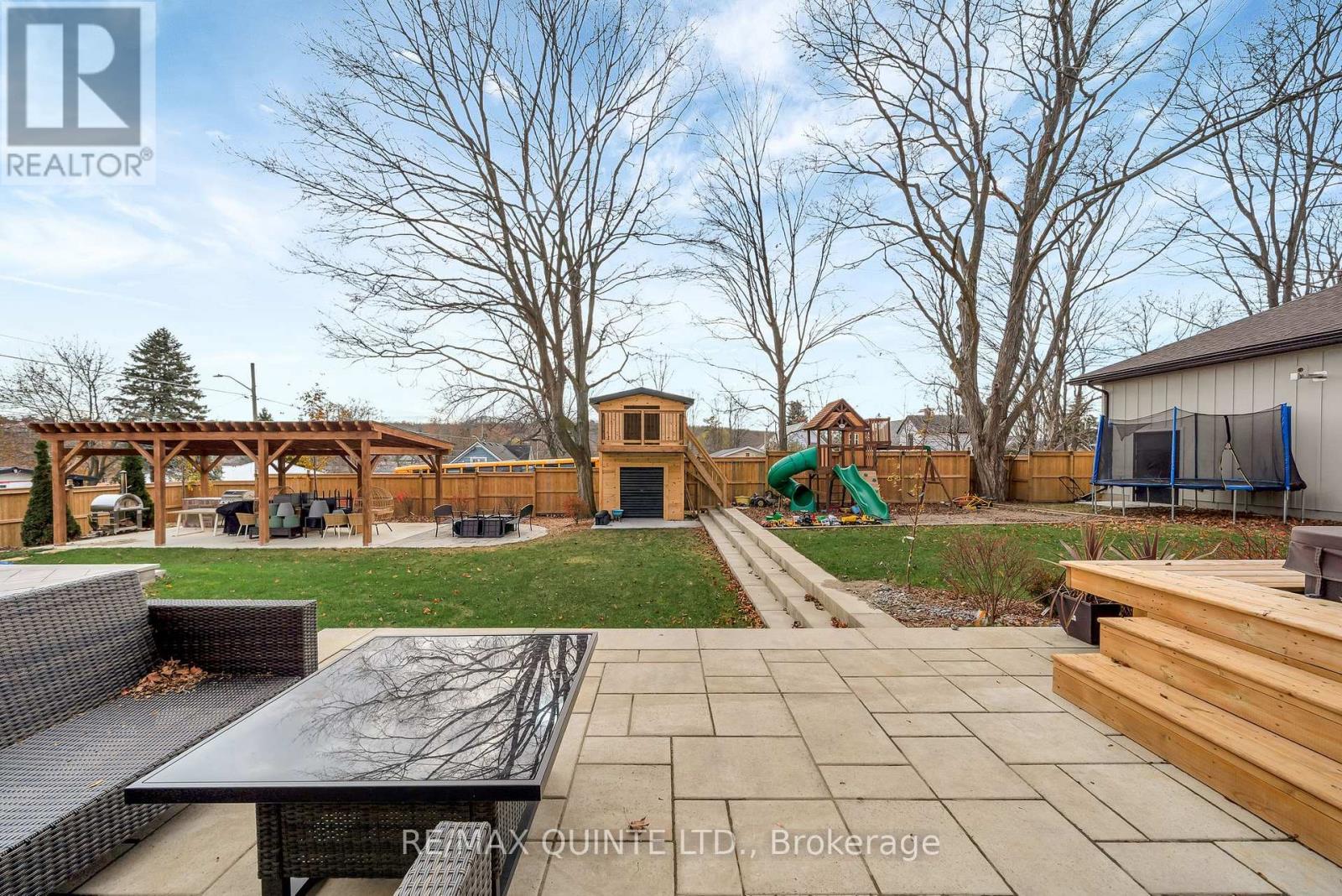Rear yard with pergola/outdoor kitchen - 88 Bridge Street, Prince Edward County (Picton Ward), ON - Outdoor
