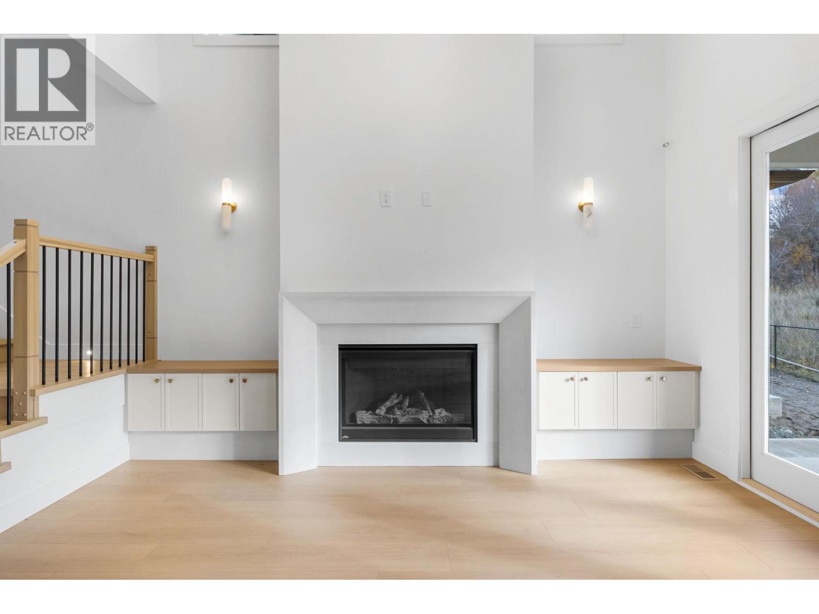 1012 Bull Crescent, Kelowna, BC - Indoor Photo Showing Living Room With Fireplace