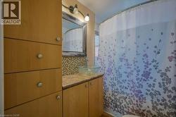 Bathroom with backsplash and vanity -