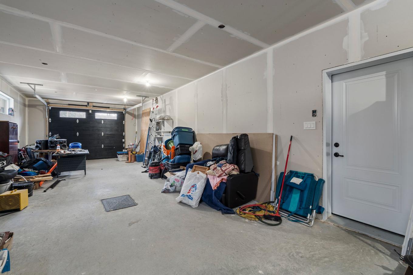 Garage - 4030 Ch. Plaisance, Sainte-Julienne, QC - Indoor Photo Showing Garage