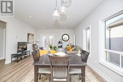 Laundry room with access to garage & ceramic sink -