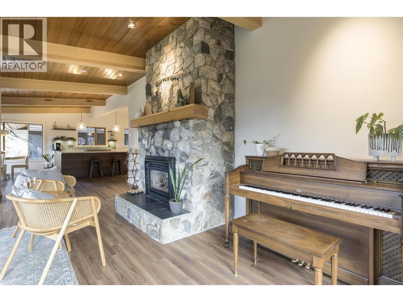 3153 Hall Road, Kelowna, BC - Indoor Photo Showing Living Room With Fireplace