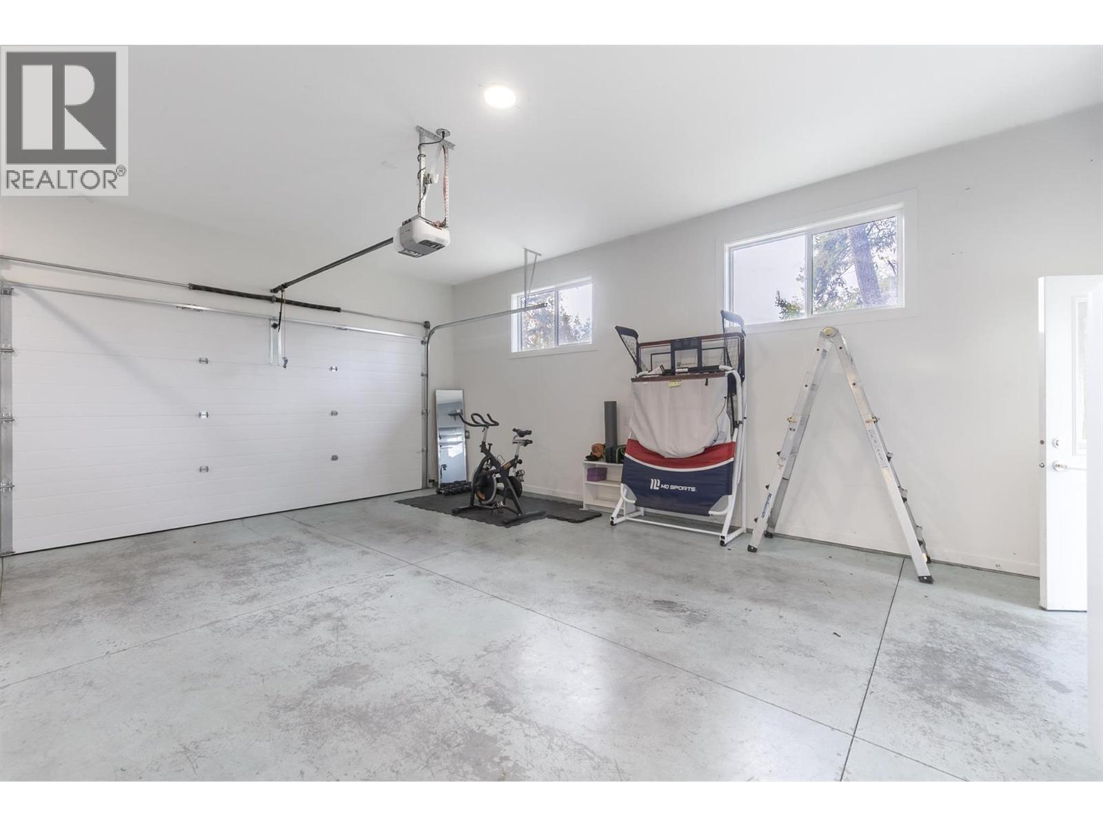 Heated garage/Potential suite - 3153 Hall Road, Kelowna, BC - Indoor Photo Showing Garage