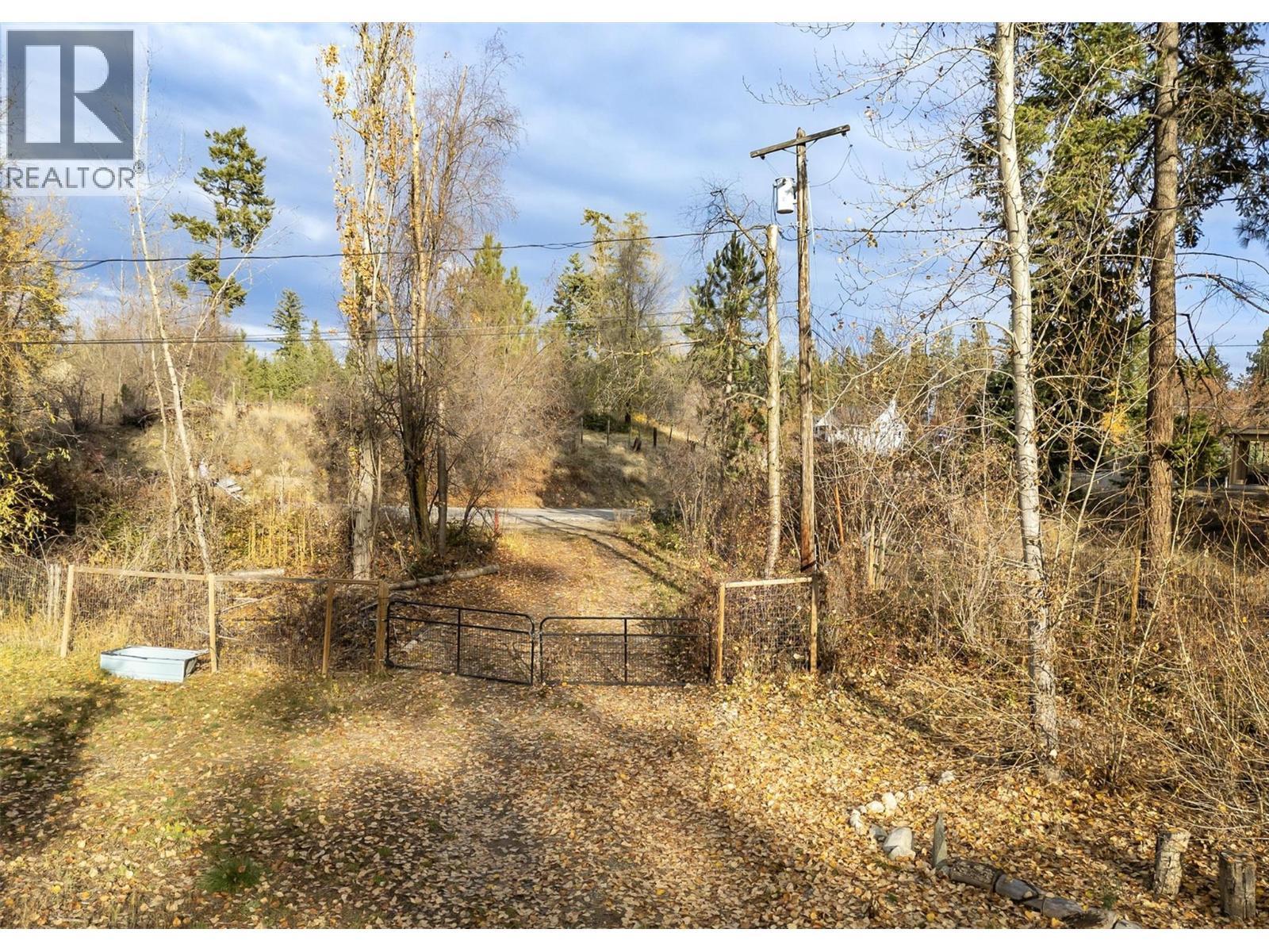 Separate entrance unto Hall rd that leads to garage/workshop - 3153 Hall Road, Kelowna, BC - Outdoor With View