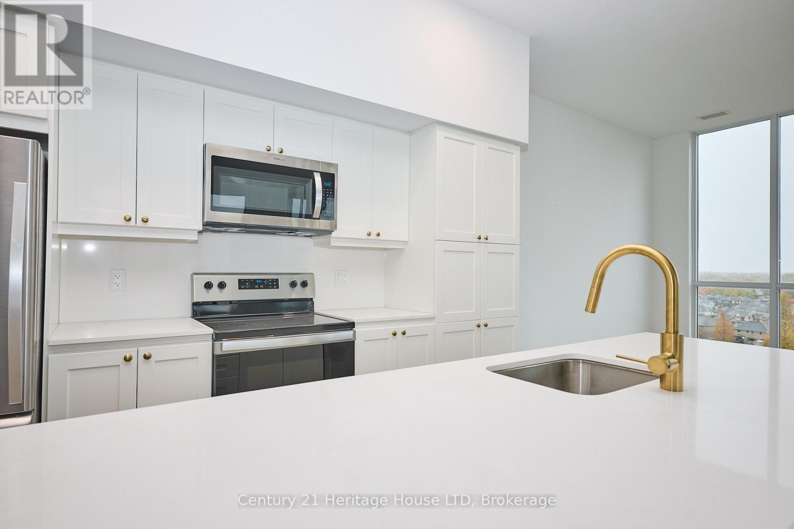 kitchen with four stainless appliances - 1001 - 7711 Green Vista Gate, Niagara Falls (Oldfield), ON - Indoor Photo Showing Kitchen With Stainless Steel Kitchen