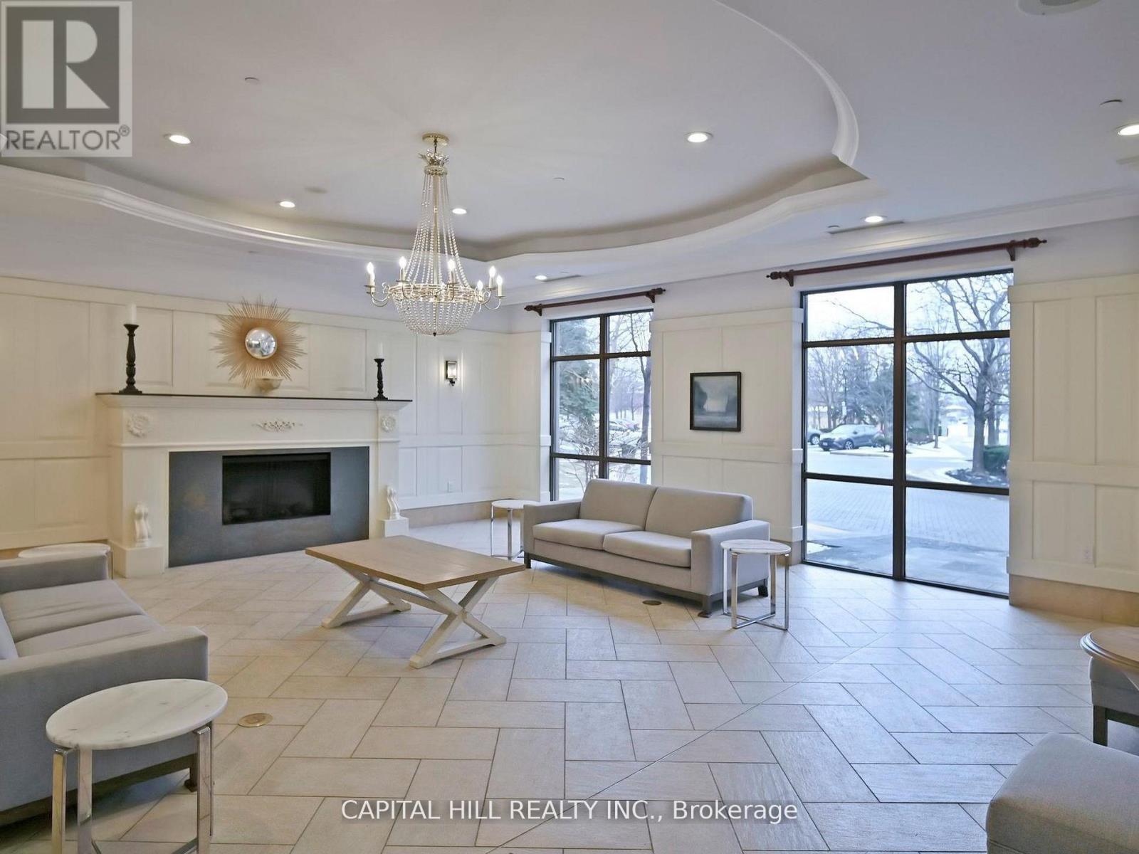 312 - 710 Humberwood Boulevard, Toronto, ON - Indoor Photo Showing Other Room With Fireplace