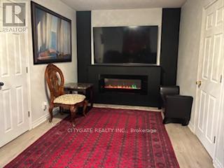 7801 Woodbine Street, Niagara Falls, ON - Indoor With Fireplace