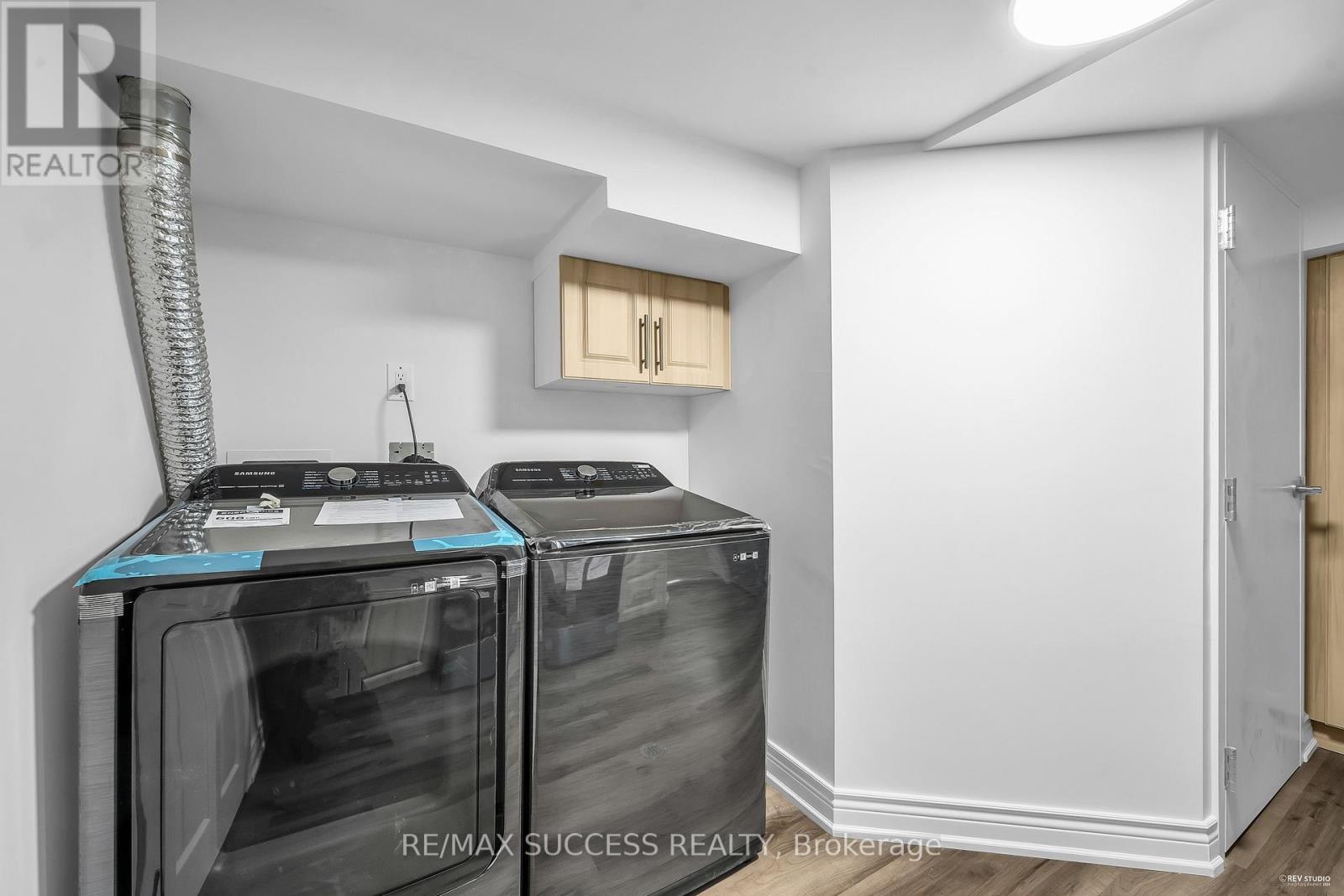 03 - 15 Killamarsh Drive, Toronto, ON - Indoor Photo Showing Laundry Room