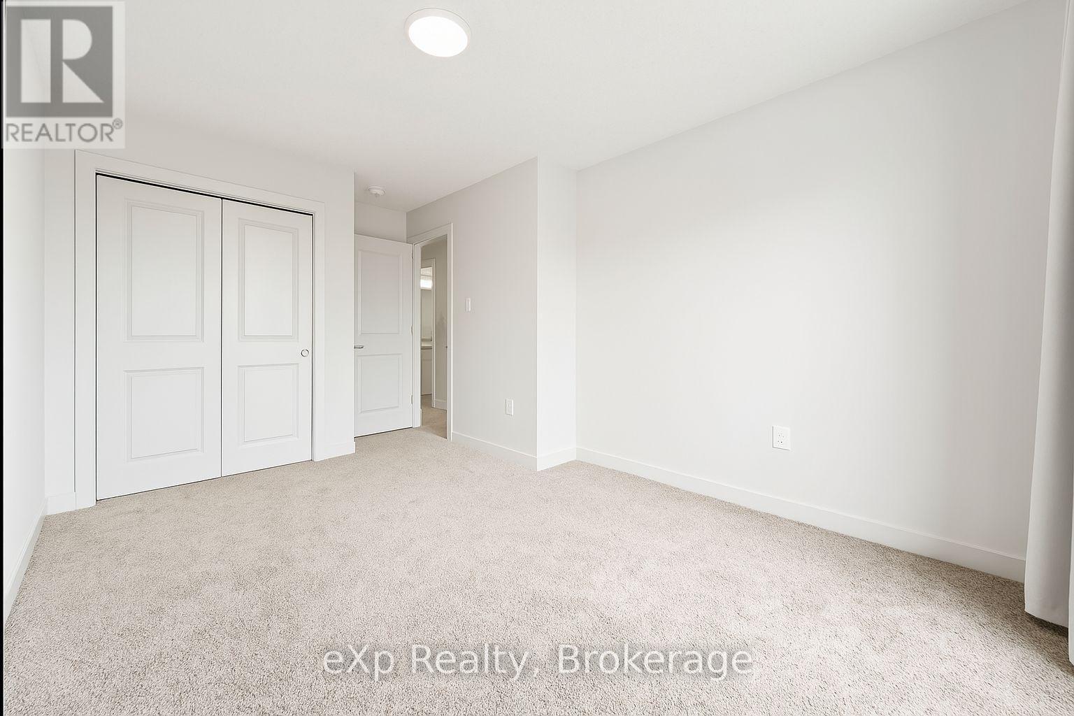 118 - 824 Woolwich Street, Guelph (Riverside Park), ON - Indoor Photo Showing Other Room