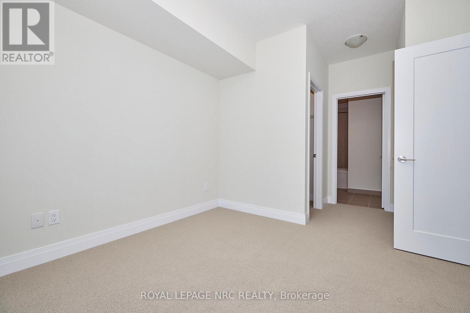 545 - 16 Concord Place, Grimsby (Grimsby Beach), ON - Indoor Photo Showing Other Room