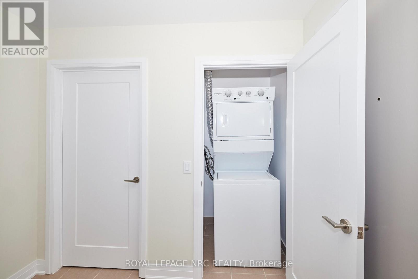 545 - 16 Concord Place, Grimsby (Grimsby Beach), ON - Indoor Photo Showing Laundry Room