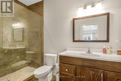 Tiled bath Glass shower -