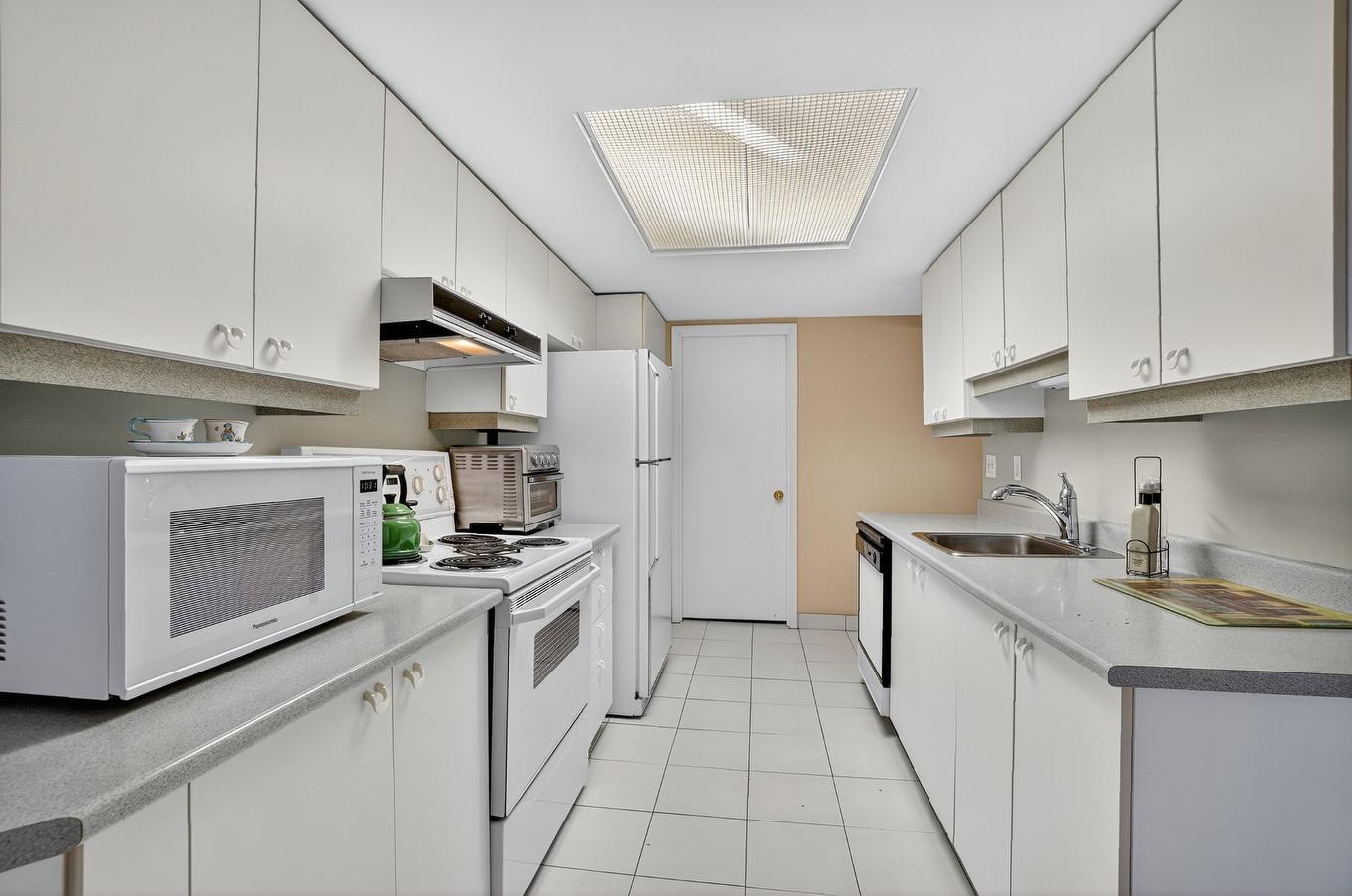 Cuisine - 306-755 Rue Muir, Montréal (Saint-Laurent), QC - Indoor Photo Showing Kitchen