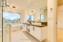 Primary bath double floating vanity/large window -