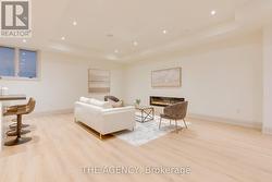 Basement open concept rec room combined w/wet bar -