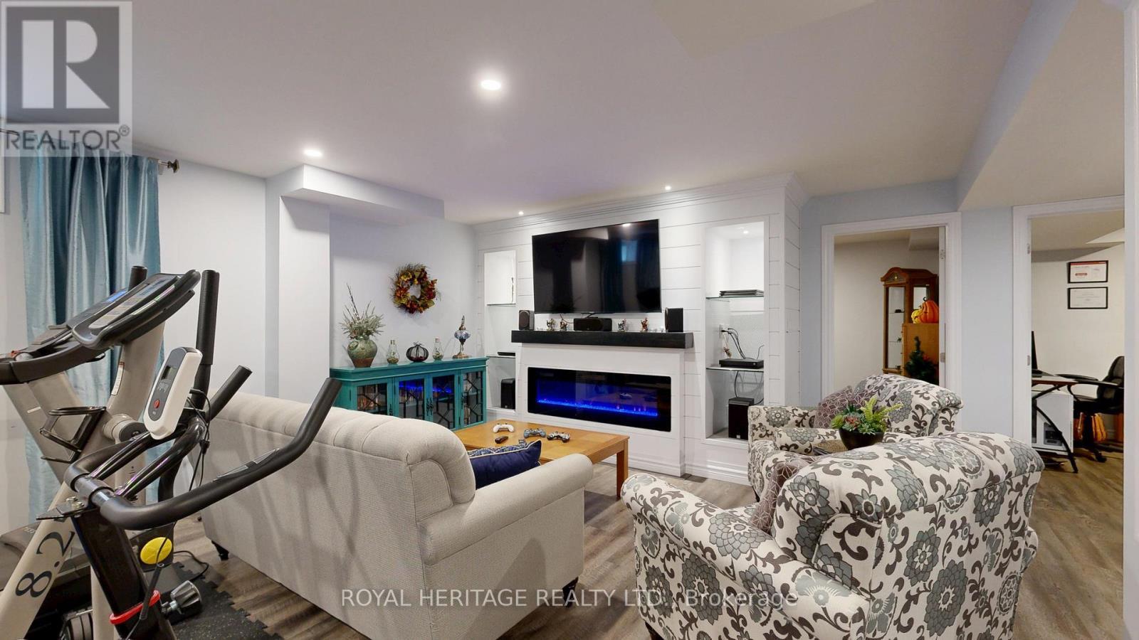 Basement Electric fireplace w custom media center - 976 Avery Avenue, Peterborough (Monaghan Ward 2), ON - Indoor With Fireplace