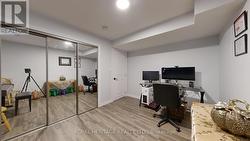 Basement - 2nd bedroom with deep mirror closet -