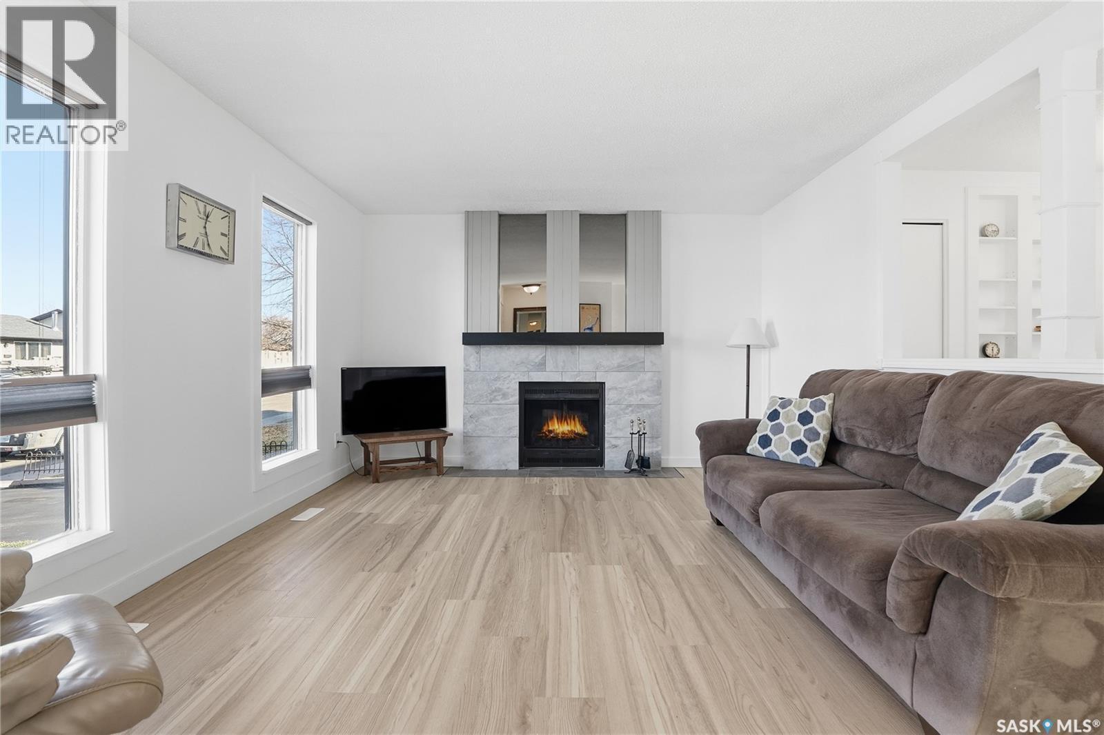 147 Makaroff Road, Saskatoon, SK - Indoor Photo Showing Living Room With Fireplace