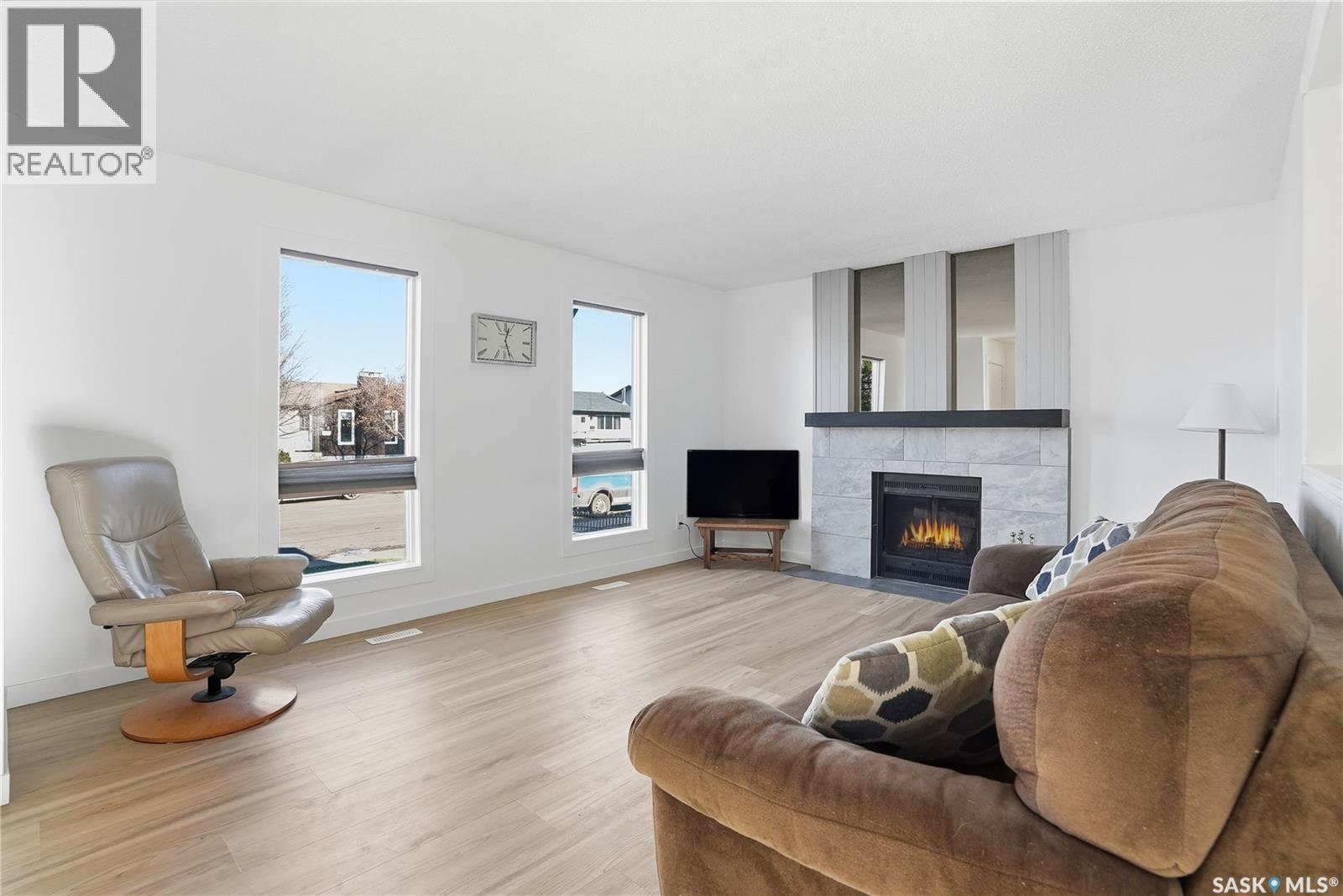 147 Makaroff Road, Saskatoon, SK - Indoor Photo Showing Living Room With Fireplace