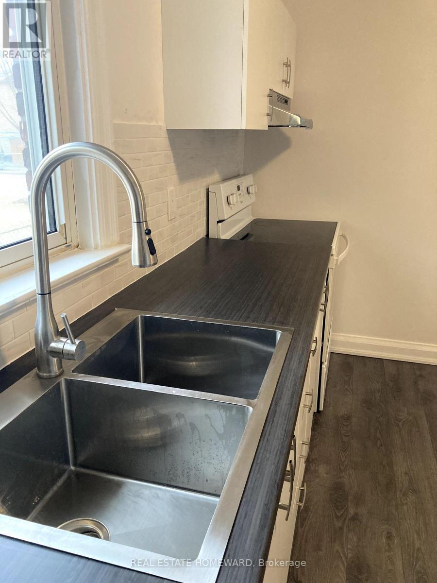 322 Cosburn Avenue, Toronto, ON - Indoor Photo Showing Kitchen With Double Sink