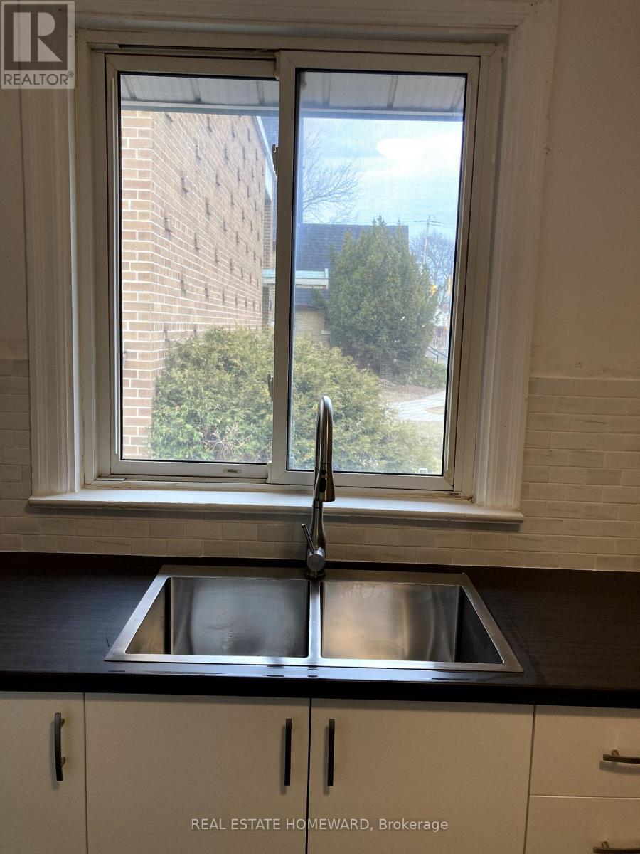 322 Cosburn Avenue, Toronto, ON - Indoor Photo Showing Kitchen With Double Sink