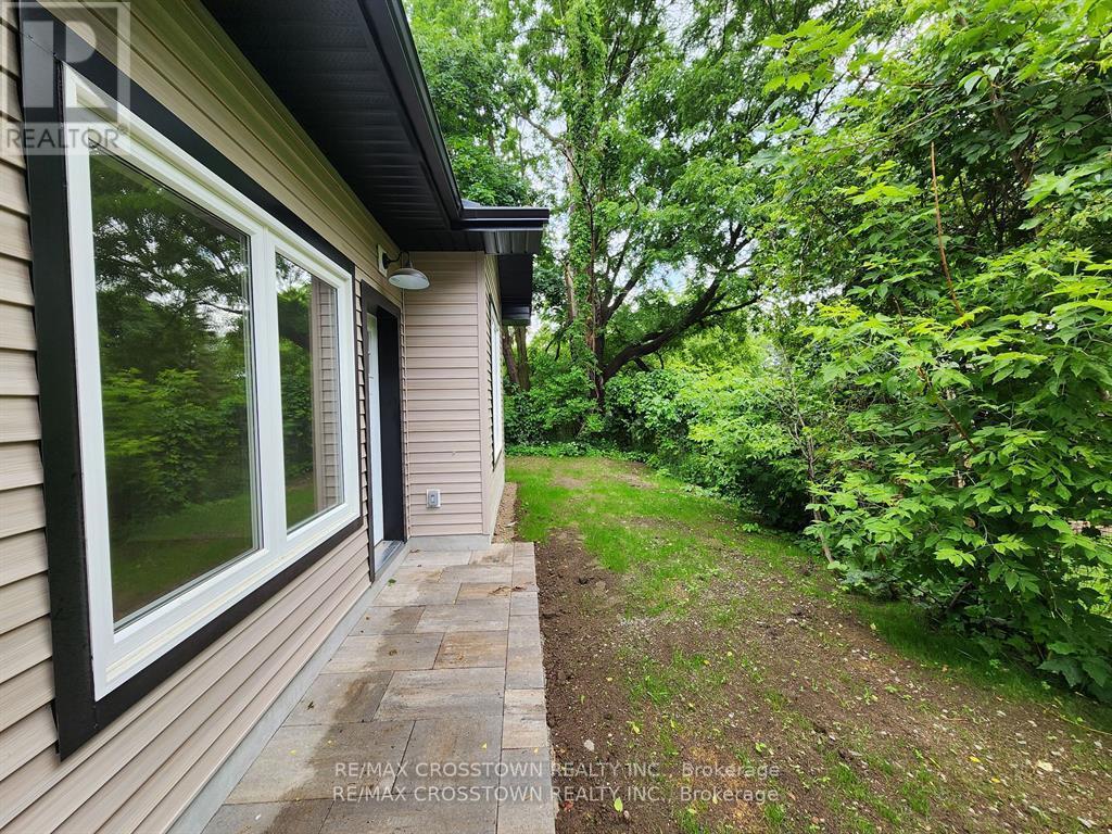 Backyard (photo from 2023, grass is grown in now) - Gdn Ste - 120 Dundonald Street, Barrie, ON - Outdoor