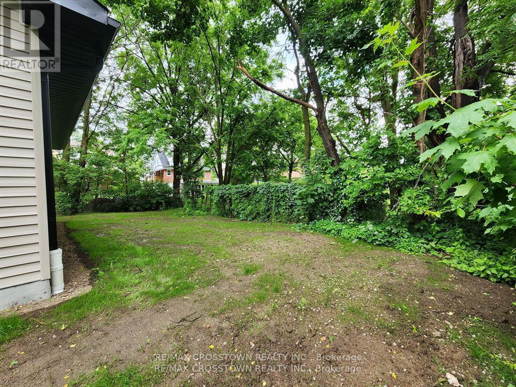 Backyard (photo from 2023, grass is grown in now) - Gdn Ste - 120 Dundonald Street, Barrie, ON - Outdoor